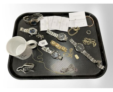 A group of gent's wristwatches including Sekonda and Pulsar, costume jewellery, gilt metal chains, ceramic coffee mug, etc.