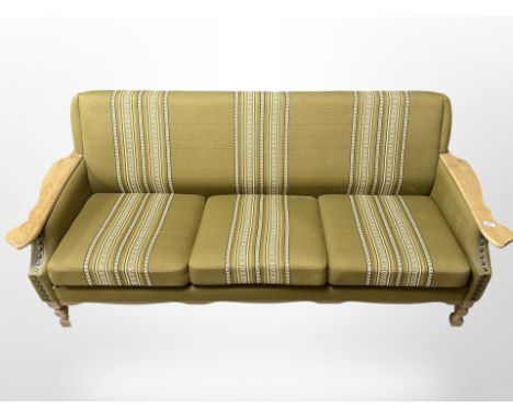 A Danish light oak three-seater settee, 186cm wide x 75cm deep x 77cm high.