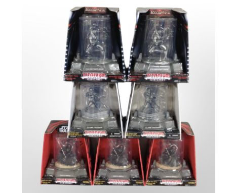 Seven Hasbro Titanium Series die-cast figurines including Star Wars and Battlestar Galactica, boxed.