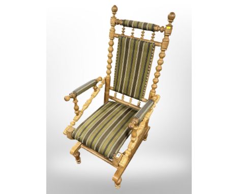 A Danish bobbin turned oak rocking chair.