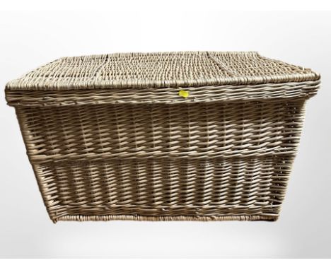A wicker hamper, width 82cm.