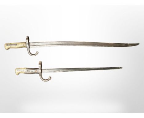 A French model 1866 Chassepot sword bayonet, together with a further French Lebel bayonet, dated 1881.