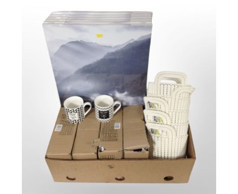 A quantity of new ceramic mugs, Curver plastic twin-handled baskets, wall canvases. (1 box)
