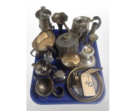 A group of antique stainless steel and pewter tea wares, candlestick, cutlery, inkwell, table lighter in the form of a miner'