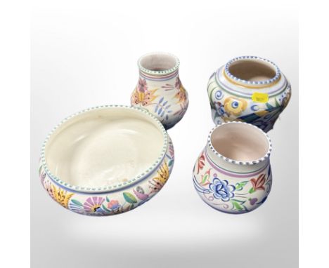 Four pieces of Poole pottery.