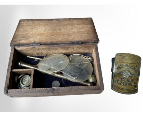 A set of scales with weights in oak box, together with a Fenner & Alder Limited genuine linseed oil paperclip.