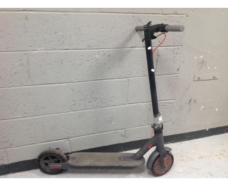 An Aovopro electric scooter.
