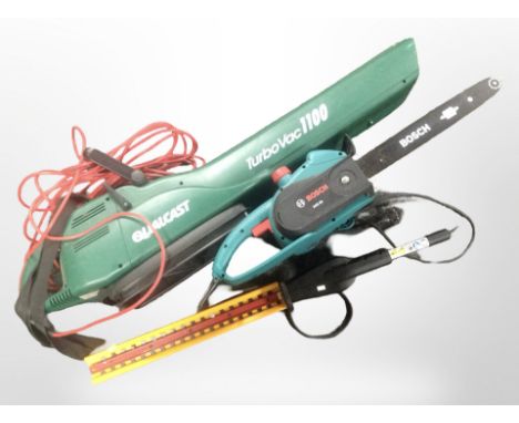 A Bosch electric chainsaw, a Qualcast garden vacuum, and a Ryobi expandit hedge clipper attachment.