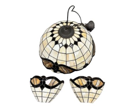 A Tiffany-style glass light shade, diameter 48.5cm, together with a pair of matching wall lights.