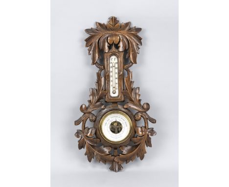 Wandbarometer, 20. Jh., Holz, durchbrochen beschnitzt. Thermometer mit QUecksilbersäule, Barometer. Leicht ber. &amp; best., 
