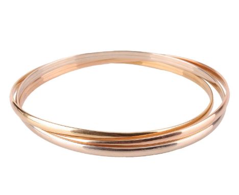 A trinity bangle in 18ct gold, formed of three interlocking bangles in yellow, rose and white gold, Italian and British marks