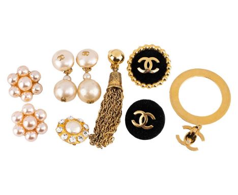 A miscellaneous group of earrings; to include a pair of Chanel faux pearl drop earrings with applied CC logos, signed and mar