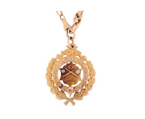 An Australian billiard medal on chain, the medal centred with a shield-shaped cartouche with billiard cues motif, embellished