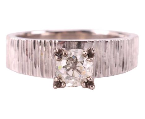A diamond solitaire ring, featuring an old-cut diamond, measuring approximately 4.9mm with an estimated carat weight of 0.40c