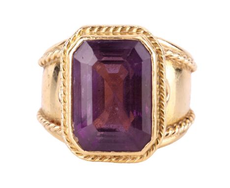 An amethyst cocktail ring in Etruscan style, comprising an octagonal-cut amethyst of 15.2 x 11.0 x 10.3 mm, in collet setting