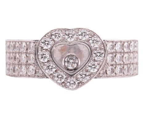 Chopard - a 'Happy Diamonds' heart ring in 18ct white gold, heart-shaped motif enclosing a single floating brilliant-cut diam