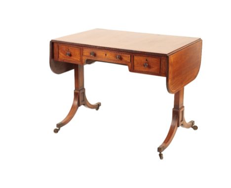 AN ANGLO-CHINESE PADOUK SOFA TABLE of Sheraton design, the rectangular flap top with rounded corners and inlaid with contrast