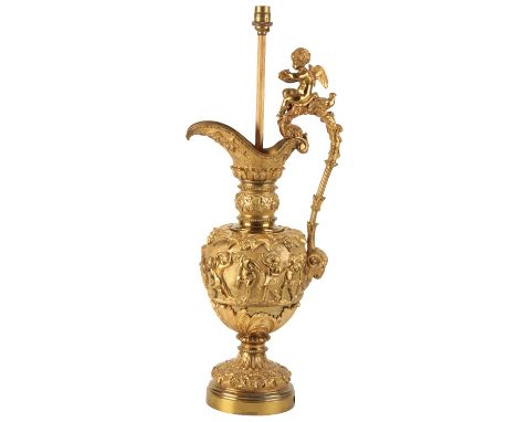 A CONTINENTAL GILT BRONZE TABLE LAMP IN RENAISSANCE REVIVAL TASTE, Circa 1900, modelled as a ewer, the spout exterior relief 