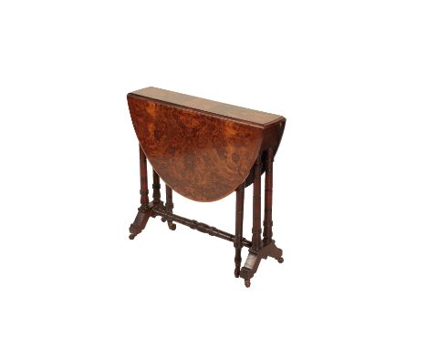 A VICTORIAN FIGURED WALNUT SUTHERLAND TABLE, Last quarter 19th century, the oval top with twin drop leaves, with twin turned 