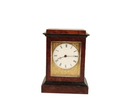 A VICTORIAN BURR WALNUT TABLE CLOCK the 7cm round dial, with Roman numerals, surrounded by a gilt engraved mask, key wind mov