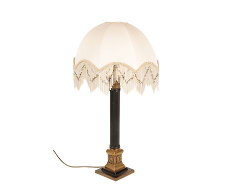 A GILT METAL TABLE LAMP IN BAROQUE STYLE, In the manner of an altarstick, early 20th century, with knopped, waisted, baluster