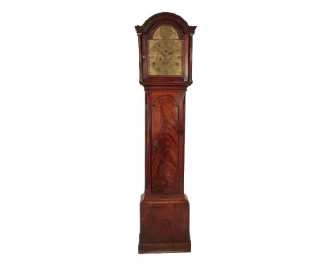 A GEORGE III MAHOGANY LONGCASE CLOCK the brass arched dial, with subsidiary seconds dial, and engraved floral center, the car