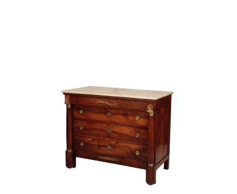 A RESTAURATION CHERRY WOOD, GILT BRONZE MOUNTED AND MARBLE TOPPED COMMODE, Circa 1830, the rectangular top above a projecting