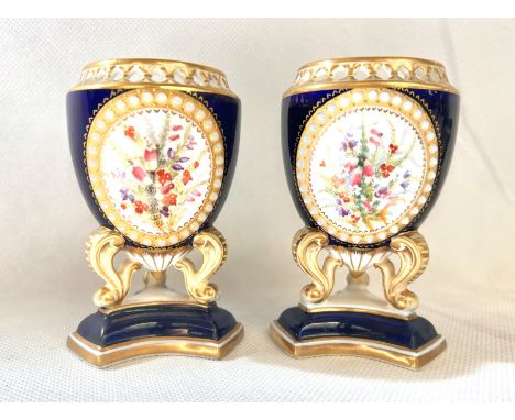 A pair of hand painted Royal Worcester vases, James Green and nephew London, height 10cm