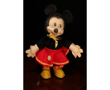 A 1940's/1950's Merrythought novelty Minnie Mouse, the pressed moulded face with painted features, black felt ears, black plu