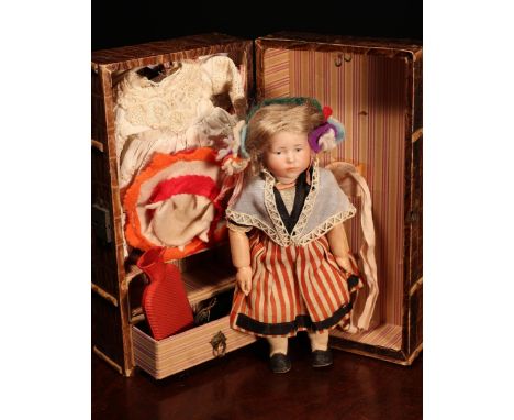 A Kämmer &amp; Reinhardt (Germany) bisque head and painted composition over wood bodied 'Marie' character doll, the bisque he