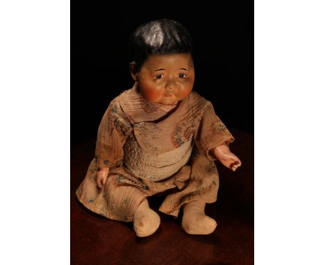 An early 20th century Horsman 'Baby Butterfly' painted composition head doll, the painted composition head with painted featu