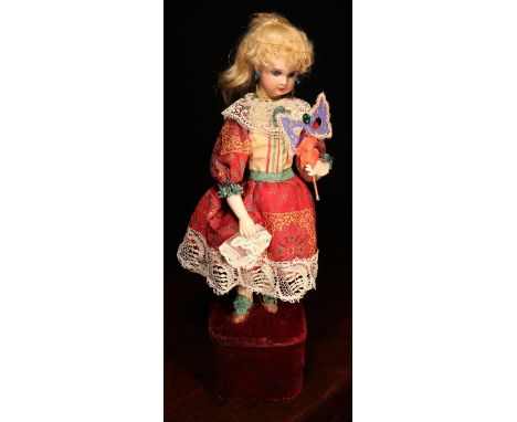Automata - a late 19th century bisque head musical automaton doll, attributed to Leopold Lambert or similar, the bisque head 