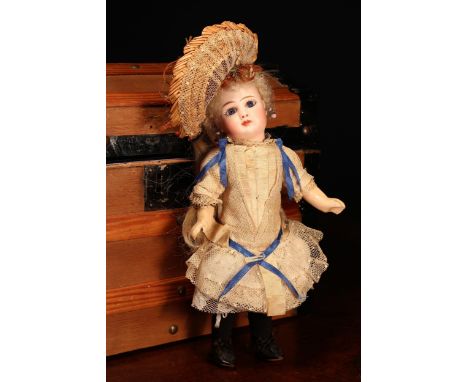 A Jules Nicholas Steiner (France) bisque head and jointed painted composition Bébé doll, the bisque head with inset fixed blu