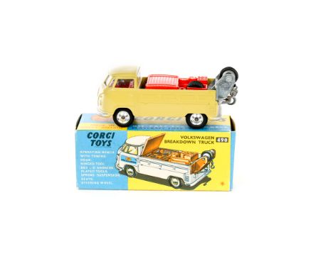 A Corgi Toys Volkswagen Breakdown Truck (490). An example in light olive green with red interior and flatbed load. Boxed, ver