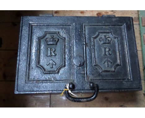 An interesting 19th century heavy iron strong box, the lid having two sunken panels embossed with Victorian crown over “R” (R