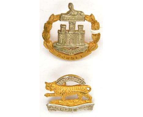 2 officers gilt and silver plated badges: R Leicster beret and Dorset cap. VGC                                  