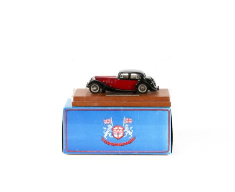 A RAE Models Miniature Classics MG SA Saloon. An example in black and red with light brown interior. Boxed, with display plin