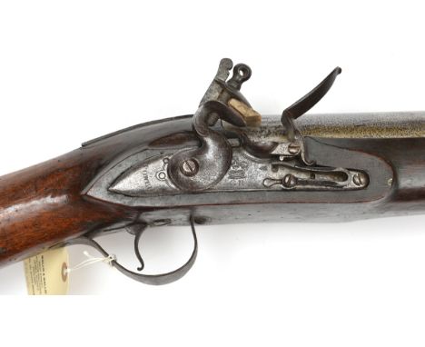 A massive heavy flintlock punt gun or wall piece, 79” overall, barrel 62” with small bead fore sight, the breech struck with 