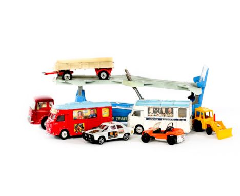 A small quantity of Corgi Toys. A Bedford Carrimore Car Transporter. A carded packet containing a full set of 12 spare Golden