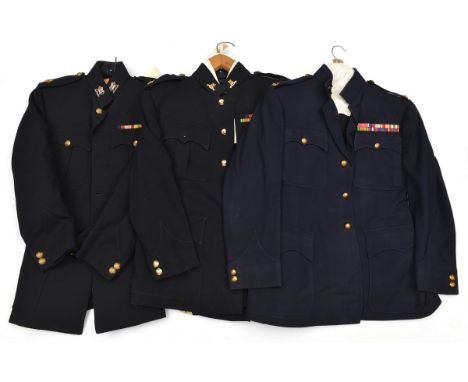 A Buffs blue jacket with silvered collar badges and major rank; a Royal Army Pay Corps blue jacket and trousers with double y