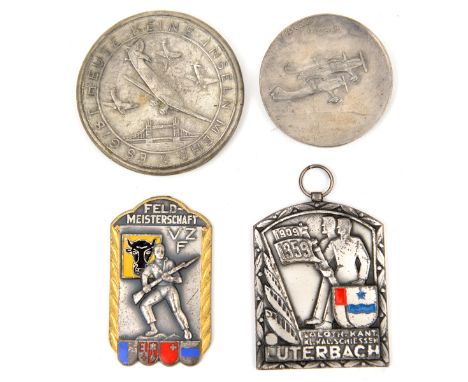 A Third Reich cast WM propaganda medallion, 2” diameter, depicting German aircraft over Tower bridge; a similar promotional a