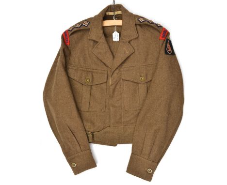 A Captain’s khaki BD blouse of The R Engineers, with 7th Armoured Division “Desert Rats” cloth shoulder badges, and factory l