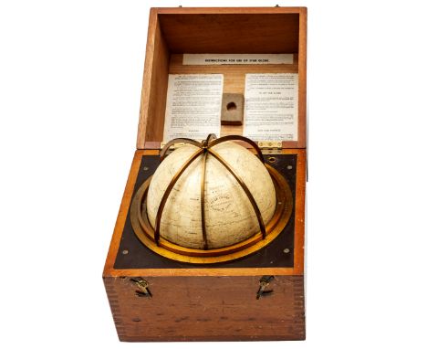 A cased seven inch “Star Globe Epoch 1975”, manufactured by Kelvin & Hughes,  contained in its wooden fitted case. The celest