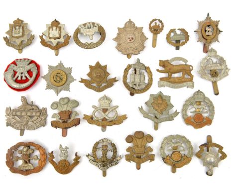 24 different infantry cap badges,  including Leicester, Cheshire 1st patt and 2nd patt (slide missing), Gloucester with large