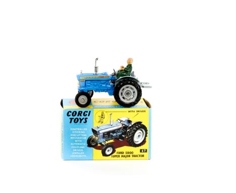 A Corgi Toys Ford 5000 Super Major Tractor (67). An example with blue body, grey mud guards, grey plastic wheels and driver. 