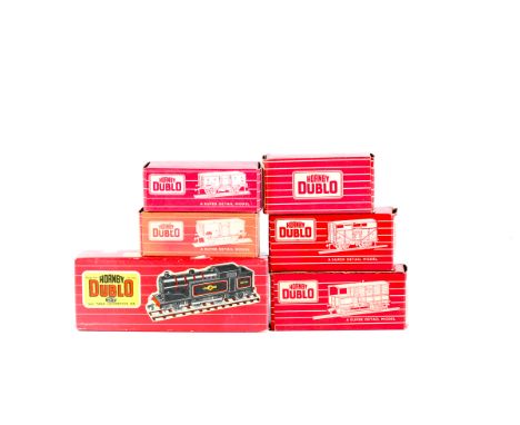 A quantity of Hornby Dublo. A BR class N2 0-6-2 tank locomotive RN69550  in lined black livery. Plus 11 freight rolling stock
