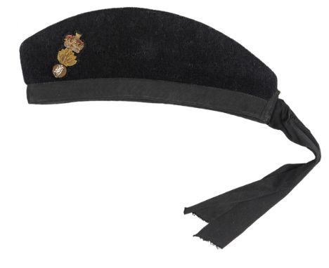 An officer’s blue cloth glengarry of The R Irish Fusiliers,   embroidered badge, silk tails, gilt label of “Dunn & Co Ltd, Ha