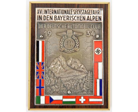 A Third Reich motorsport silvered and enamel rectangular plaque,  2½” x 3½”, embossed with the badge of the FICM and “Der Deu