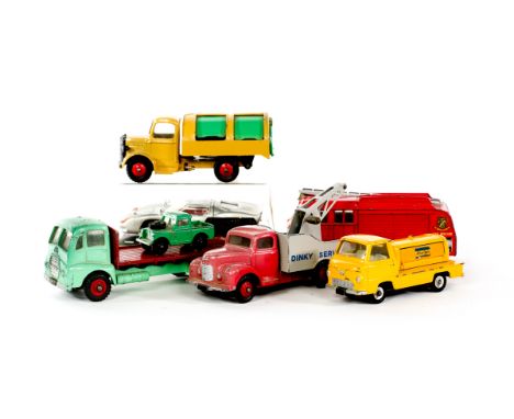 15 Dinky Toys. A Bedford Coal Lorry with coalman and sacks of coal. A Coles Mobile Crane. A Ford 40-RV. A Guy Flatbed wagon. 