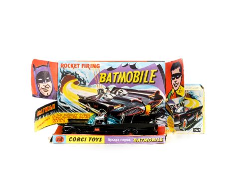 A first issue Corgi Toys Batmobile (267). An example in gloss black with Batman and Robin figures and pulsating exhaust flame